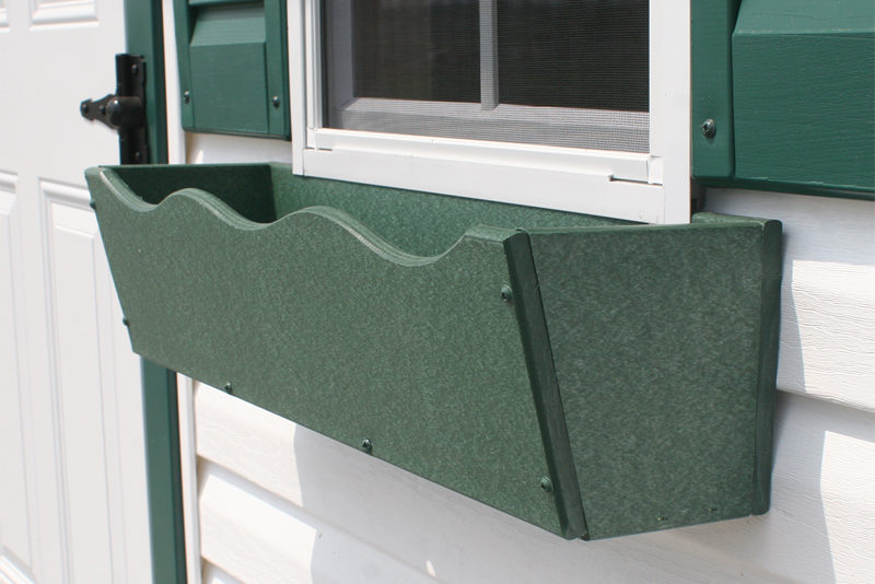 green flowerbox garage window