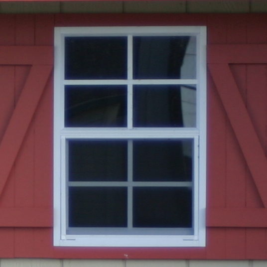 red shutters on custom garage