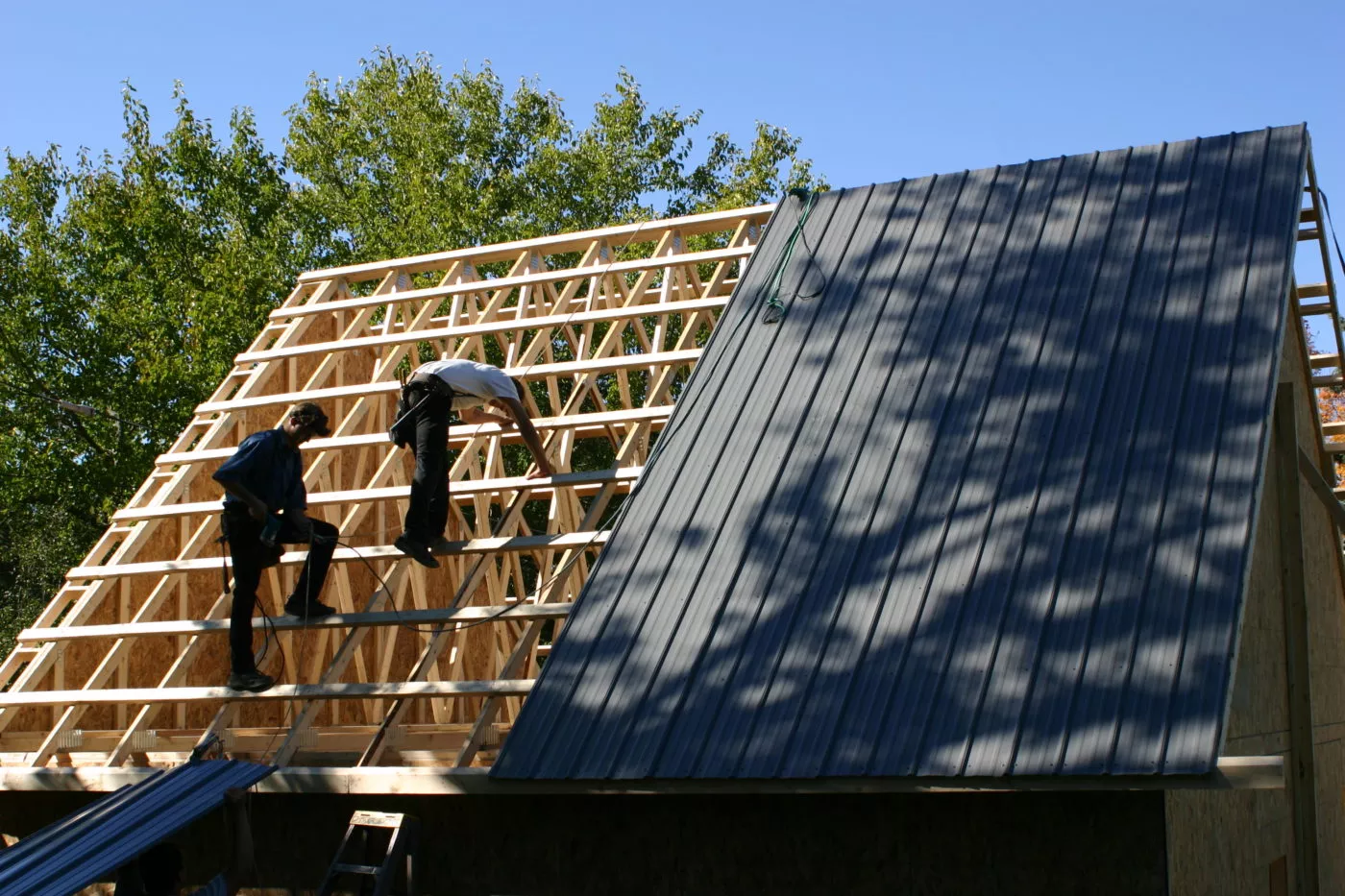 How Much Does a Detached Garage Cost? - The Complete Guide 37 two men constructing a detached garage