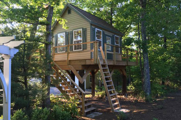 Wood Storage Sheds: The Current Top Choices 13 wooden shed in the trees 0