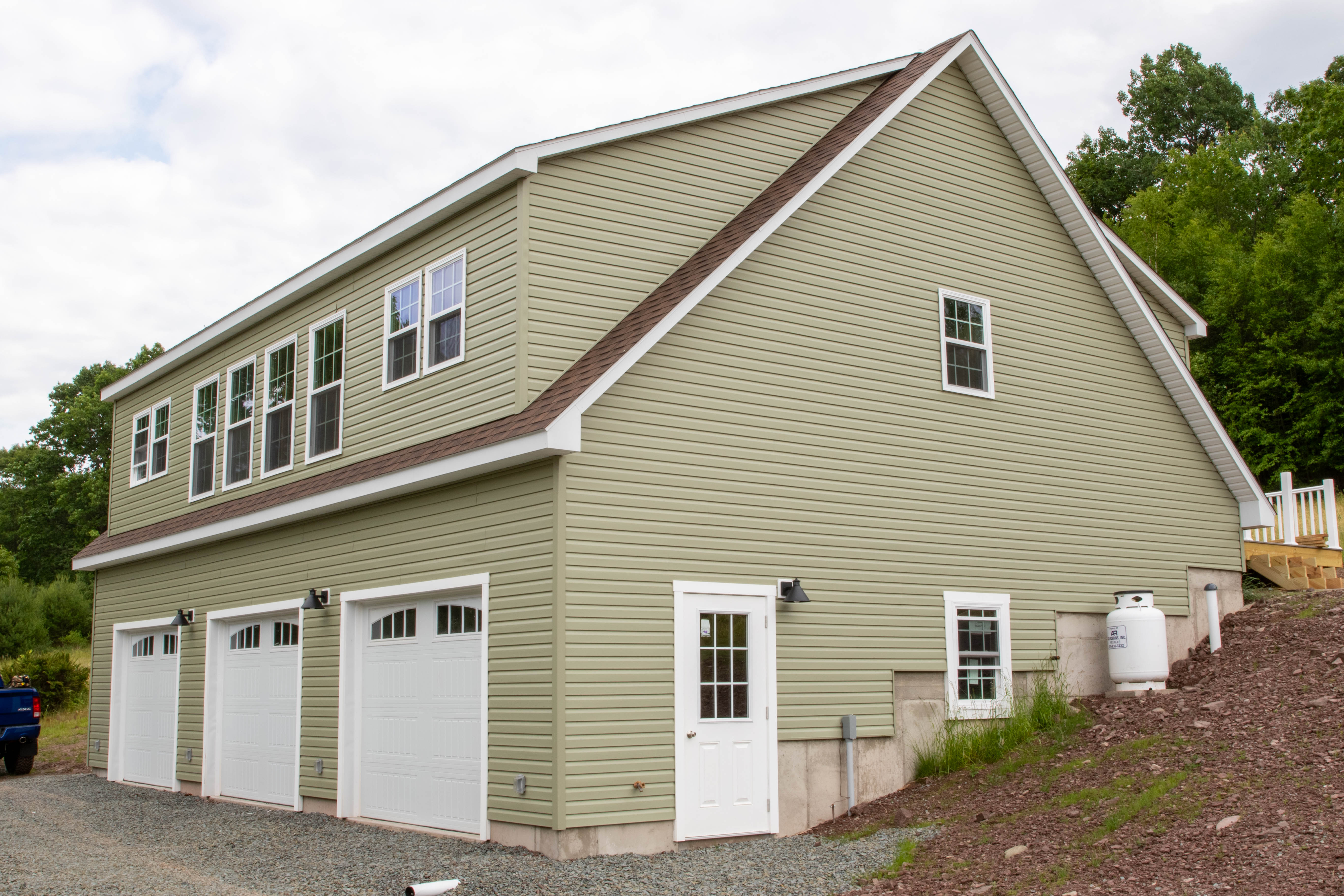 Detached Car Garage Prices 12 11215 three car garage metal roof 650x488