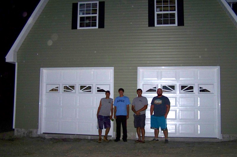 finished picture of 2 car garage with lift building